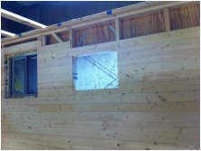 TURN ON IMAGES to see nearly finished wall inside tiny house